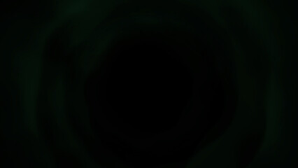 Mysterious dark abstract background with subtle green glowing light streaks creating depth and intrigue