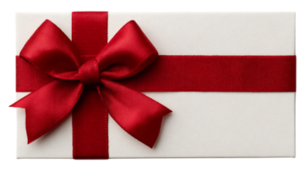 A white gift box with a large red bow and ribbon wrapped around it diagonally  isolated on white  or transparent background.