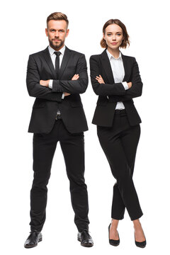 Confident Business Duo Man with Beard and Woman in Heels Arms Crossed.