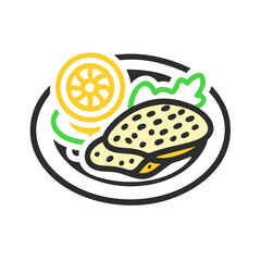 Chicken breast with lemon served on a black plate