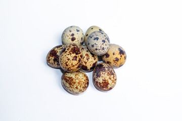 Obraz premium A group of quail eggs isolated on white background