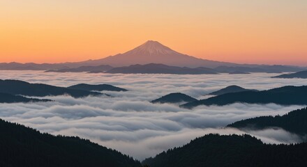 Distant volcano peak above a cloud inversion at sunrise
