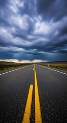 Naklejka premium Empty Highway Stretching Under Dramatic Storm Clouds.