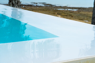 Picture of a swimming pool by the sea