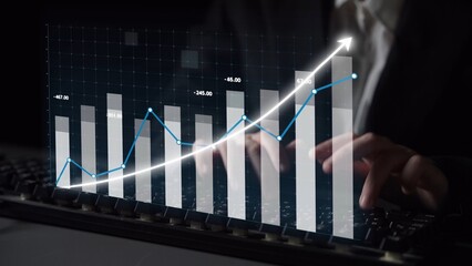 A professional workspace featuring a financial growth graph overlaid on a keyboard display, symbolizing business progress and effective data analysis strategies. Copula