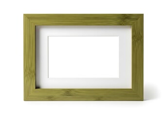 Fototapeta premium Natural green bamboo photo frame mockup with a blank white space for design presentation, standing on a surface with soft tropical palm leaf shadows