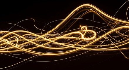 Abstract light trails on black background