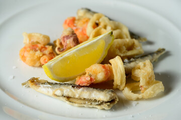 Fritto Misto del Golfo Fried Fish with Calamari, Prawns and Sardines Garnished with Lemon