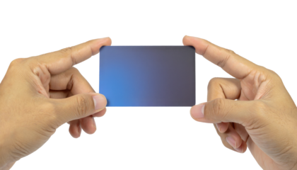 Hands Holding Credit Card with Chip and Simple Background