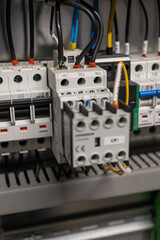 Damaged wire insulation above the terminal on a contactor &ndash; transition resistance and fire risk.
