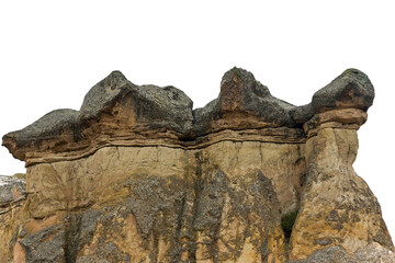 Top of Tent rocks isolated on white background. Stone pillars from basalt and tuff rocks in Goreme National Park and the Rock Sites of Cappadocia in Nevsehir Province, Central Anatolia, Turkey