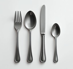 A set of silver cutlery, arranged on a plain white background