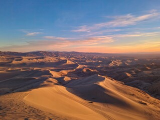 Fototapeta premium High-angle view of desert dunes at sunset
