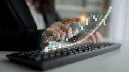 Businesswoman examines financial data through innovative touchscreen technology in a sleek office setting, emphasizing the importance of data-driven decisions. Impute