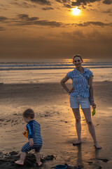 Playing on the beach in Seminyak, Bali