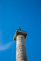 Rome, Italy - August 16, 2019: Column of Marcus Aurelius on Piazza Colonna in the center of Rome