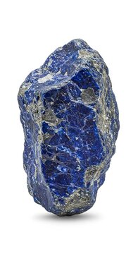 A rough uneven chunk of dark blue lapis lazuli stone with metallic pyrite flecks casting a soft shadow on a white surface