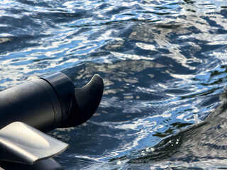 An electric trolling motor on a boat