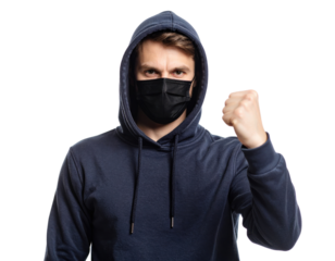 Determined man in navy hoodie and black face mask raising fist in empowering gesture against transparent background showing strength and resilience.