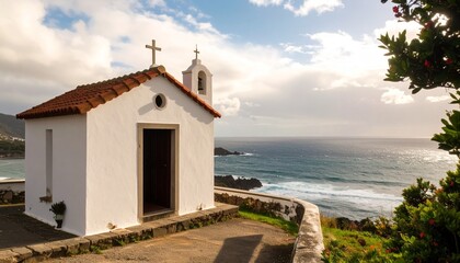 A coastal chapel with whitewashed walls and ocean view
