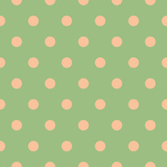 Seamless vector pattern with peach polka dots on an olive green background. Ideal for packaging, prints, and decorative projects.
