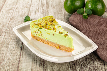 Green pistachio cheesecake served mint