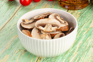 Sliced raw brown royal champignon