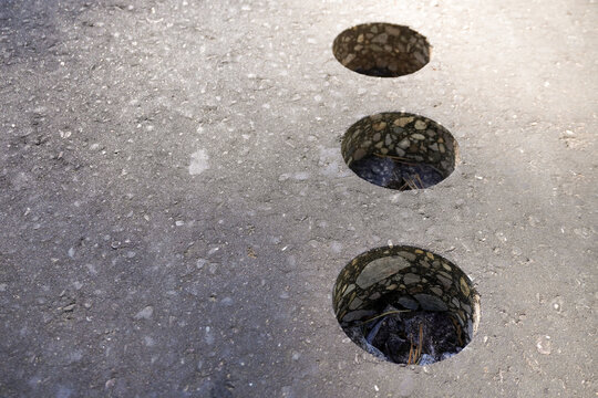 Core drilling revealing asphalt composition: examining road construction techniques