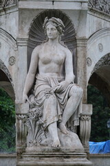Fototapeta premium Historic Flora Fountain Marble Statues Decorated with Sculpted Flora in Mumbai, India