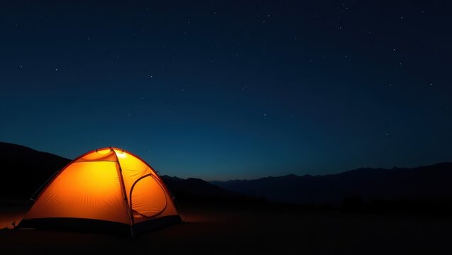 A serene camping scene under a starlit night sky, highlighting a luminous orange tent nestled amongst dark silhouettes of mountains.