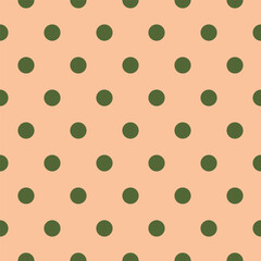 A seamless vector pattern featuring forest green polka dots on a soft peach background. Perfect for eco-style packaging and home decor.