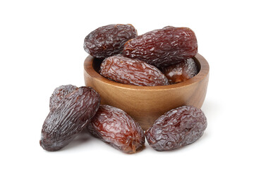 Dried dates in a wooden bowl. isolated on white background.