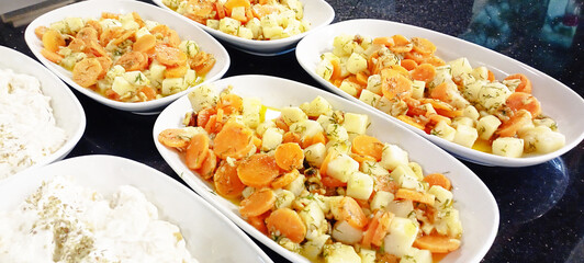 celery salad, carrot, broccoli, cauliflower salad plate view