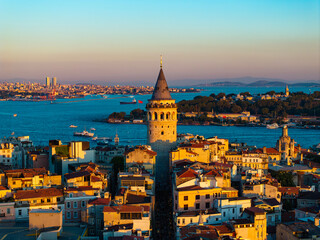 Fototapeta premium Iconic Galata Tower in the Sunset Lights Drone Photo, Galata Beyoglu, Istanbul Turkiye (Turkey)