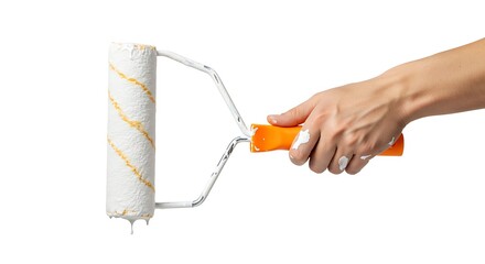 A close-up shot of a human hand expertly holding a paint roller, applying fresh white paint to a clean surface, symbolizing home renovation, DIY projects, and creative interior decorating