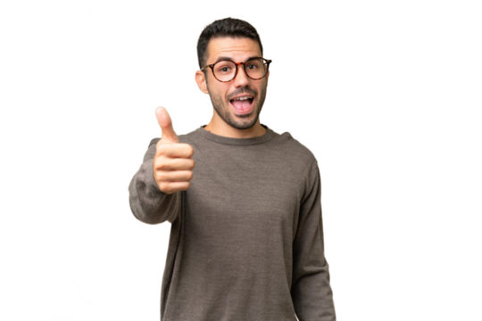 Young handsome caucasian man over isolated background with thumbs up because something good has happened - Powered by Adobe