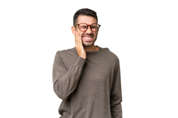 Young handsome caucasian man over isolated background with toothache