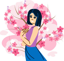 Young woman enjoying blooming sakura cherry blossoms in spring