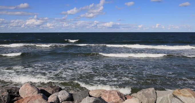 Gdansk Poland Baltic Sea rock beach. Baltic coast of northern Poland. World War II started here with German invasion. Economic international port. Historical buildings, tourism.