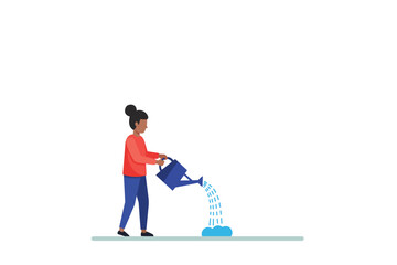 Fototapeta premium Young Woman Using Watering Can to Water the Ground Symbolically