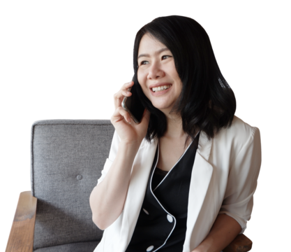 Smiling Professional Asian businesswoman in white suit talking with smartphone sitting on armchair - Powered by Adobe
