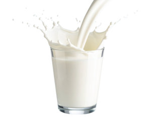 Fresh milk pouring into clear glass with dynamic splash on pastel background PNG