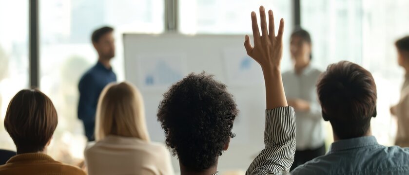 [The Woman Raising Her Hand in a Corporate Meeting During a Presentation]