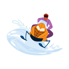 Snowmobiler riding snowmobile on snowy hill in winter