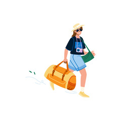 Tourist walking and carrying luggage and camera