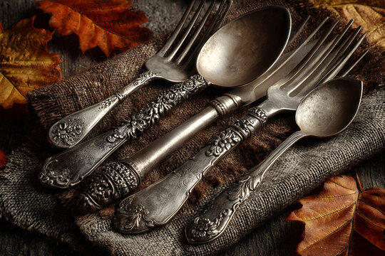 Thanksgiving autumn background with the vintage silverware
