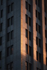 Fototapeta premium Modern high-rise skyscraper with sleek glass facade urban architecture tall structure contemporary design city skyline professional construction cityscape urban development