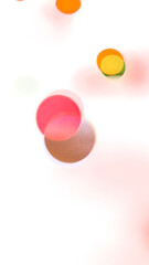 Colorful shiny glowing bokeh light overlay effect on transparent background design element