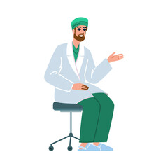 Smiling doctor sitting and gesturing with hand while explaining something