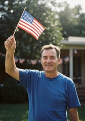 A proud, smiling man joyfully waves the American flag outdoors, showcasing his deep patriotism and celebrating national heritage on a bright, beautiful day